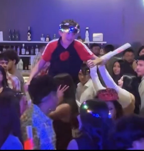 Crowd energy and celebration at the Cervantes Quinceañera